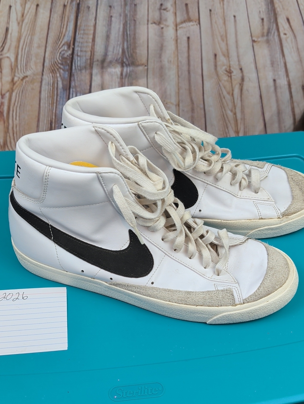 Nike White High-Top Sneakers with Black Swoosh 12